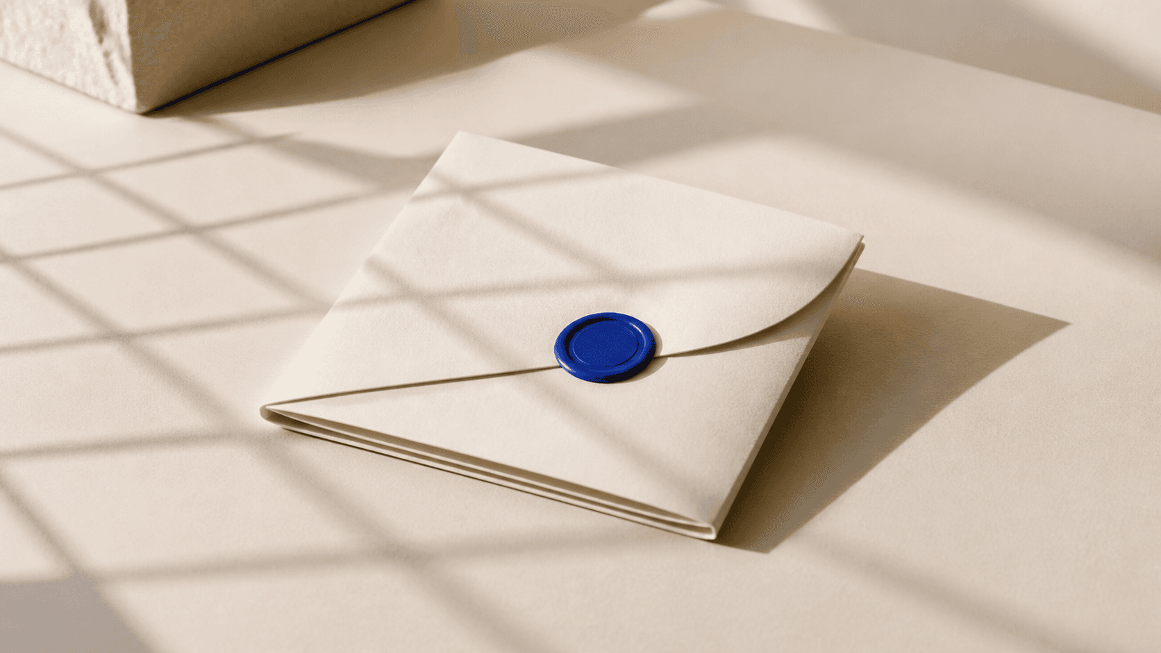 Editorial image of a sealed launch brief with a cobalt seal.